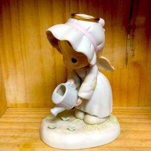 Precious Moments Some plant, some water but God giveth the increase